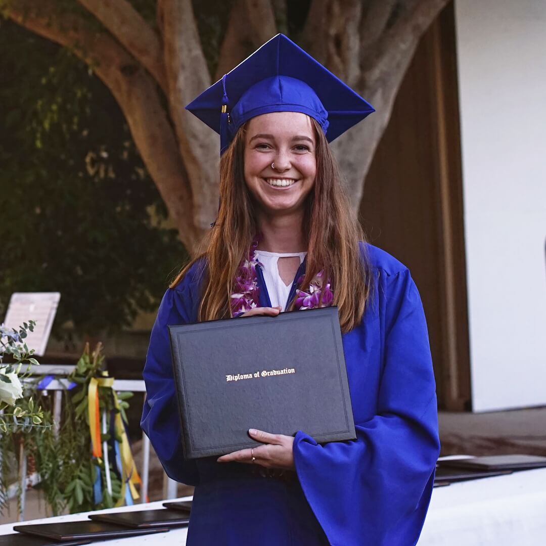 High School female student graduates.