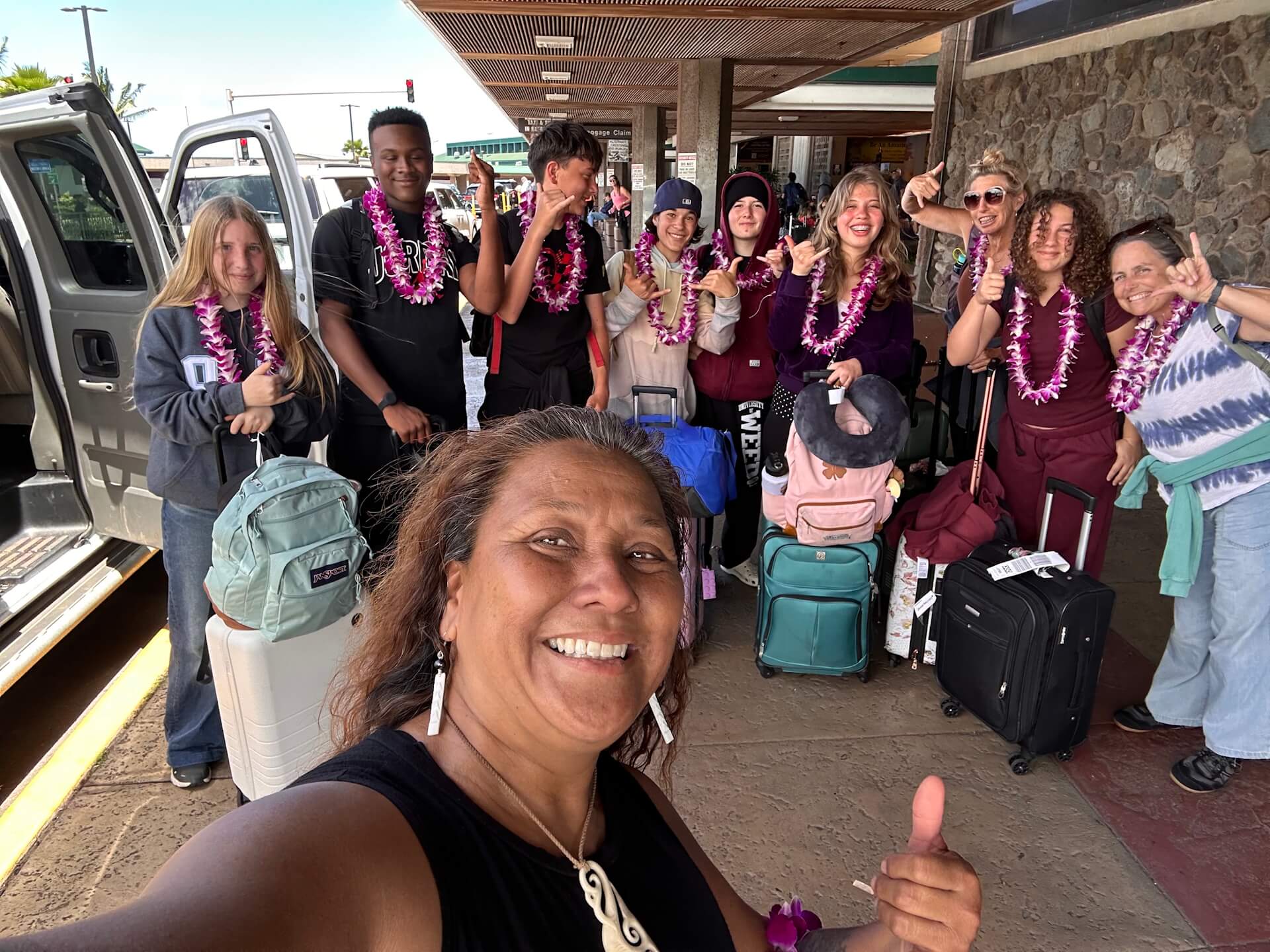 Middle School students with teacher on Hawaii field trip.